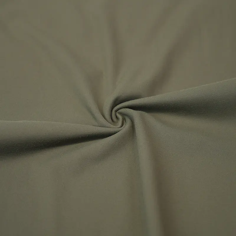 Cad é fabraic interlock spandex níolóin, agus conas atá sé difriúil ó chineálacha eile fabraicí cniotáilte?